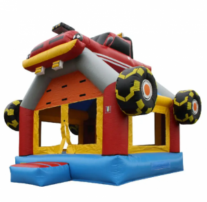 The monster truck bouncy castle stands empty and inviting, with its large inflatable tires and bright colors, ready for kids to enjoy